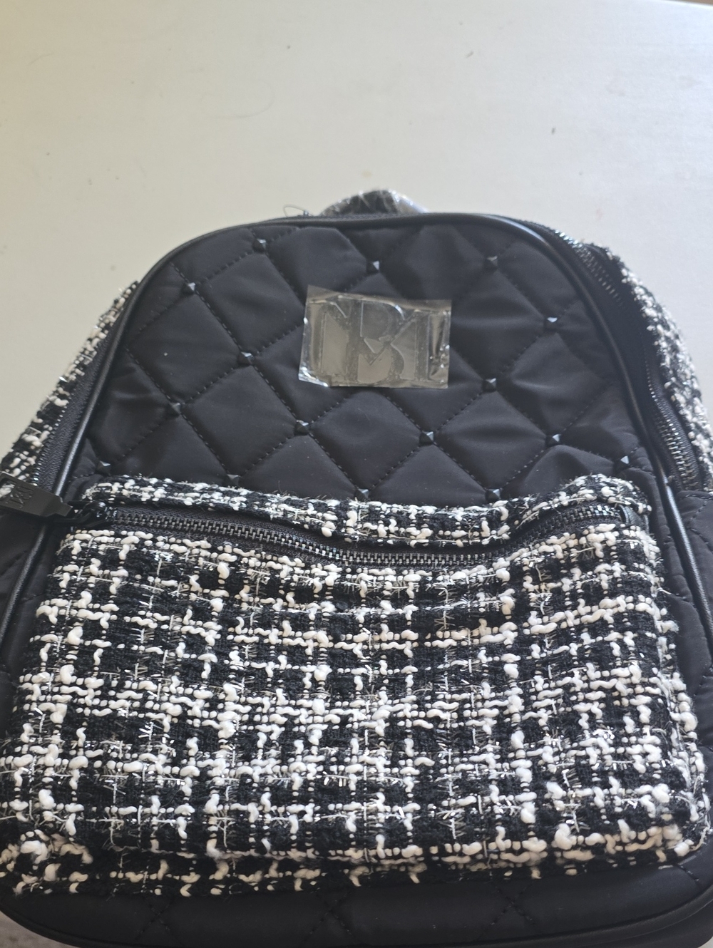 Badgley Mischka Black Quilted Backpack with Black and White Tweed Pocket